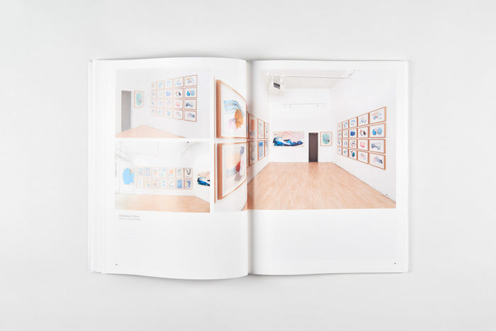 The 2018 Hashimoto Contemporary Annual by Paragon Books showcases framed abstract art on light wood floors in a brightly lit room, capturing the minimalist aesthetic of solo and group exhibitions at San Franciscos Hashimoto Contemporary Gallery.
