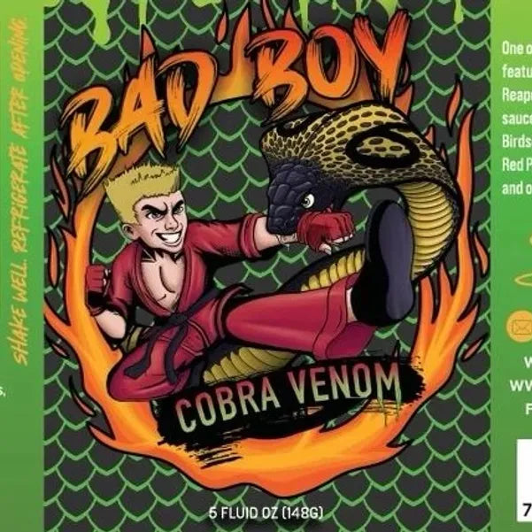 Bad Boy Cobra Venom hot sauce bottle with cartoon character kicking cobra design, 5 fluid oz
