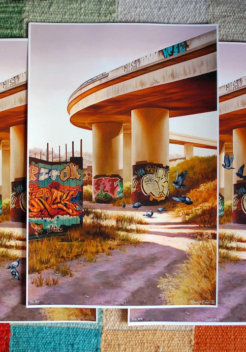 Bayview I HPM by Jessica Hess is a hand-embellished, signed, and numbered artwork showcasing an urban scene with a highway overpass, vibrant graffiti on pillars, pigeons in overgrown grass, all set against a multicolored fabric backdrop.