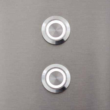 Two stainless steel LED outdoor lights with white illuminated rings on brushed metal background