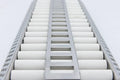 Blaze LTE ceramic flame tamer grates with white cylindrical rods and stainless steel center rail structure