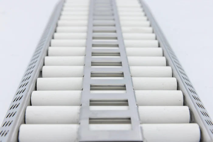 Blaze LTE ceramic flame tamer grates with white cylindrical rods and stainless steel center rail structure