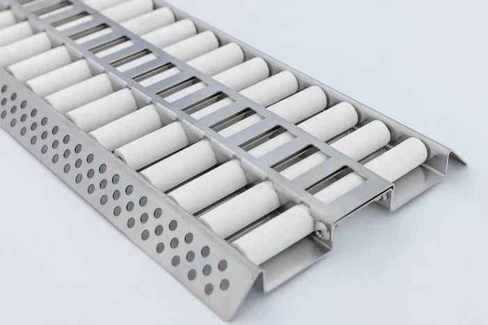 Stainless steel grill burner module with white ceramic flame tamers and perforated heat deflector
