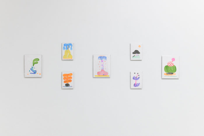 Exquisite Plant Collage (Peppermint Rain Tree)" by CHIAOZZA is a vibrant artwork with playful colors and organic shapes, arranged on a white wall like lively plant forms.