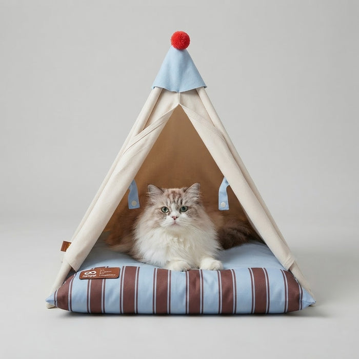 Long-haired cat relaxing in a semi-enclosed beige pet tent bed