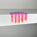 The 2023 mixed media artwork Mini #367 by Dan Lam features a vibrant, spiky, slime-like form that drips over a white surface. The piece transitions from pink to orange with a textured, three-dimensional appearance.