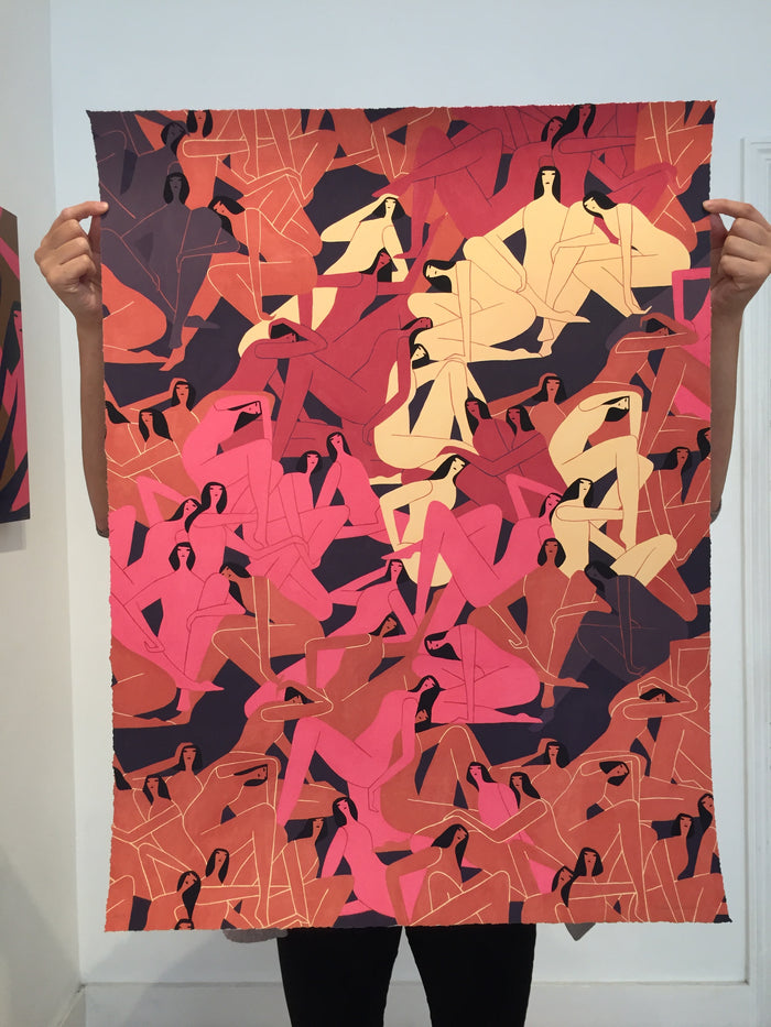 A person holds the vibrant 30 x 40 Sentient print by Laura Berger, featuring a dynamic array of abstract pink, orange, and beige human figures on a dark background. This limited edition archival pigment print is outlined in black for an energetic composition.