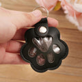White paw-shaped pet fur keepsake keyring with clear display window