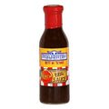 Sucklebusters Peach BBQ Sauce bottle with red cap and yellow label