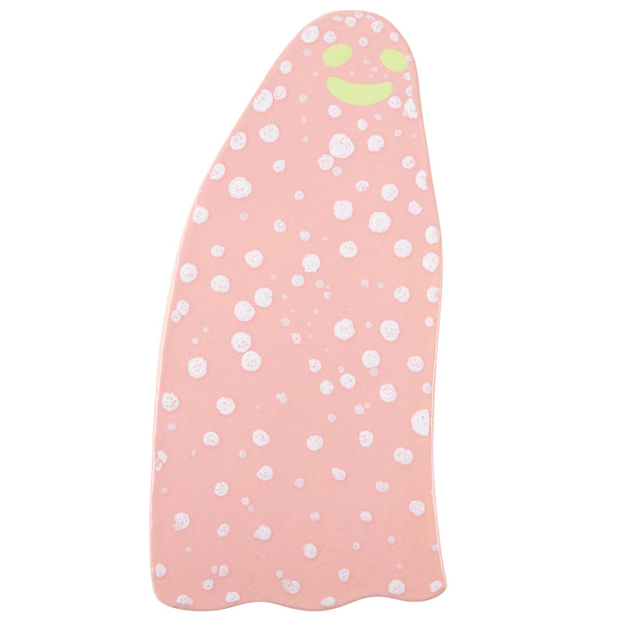 A pink surfboard from Hashimoto Contemporary, inspired by Lorien Sterns Sweet Memories Ghost line, displays a playful ghost with white polka dots, yellow-eyed smiley face.