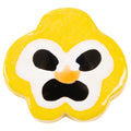 A cookie from Hashimoto Contemporary called "Yellow Pansy - Lorien Stern" features a whimsical, yellow flower shape inspired by the Yellow Pansy, with an angry cartoon face—including black eyes on a white background, an orange nose, and a black frown—evoking the playful ceramic style of Lorien Stern.